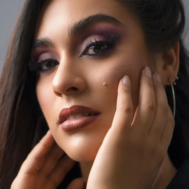An editorial smokey-eye makeup portrait